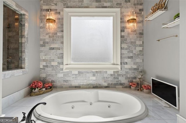 full bath featuring a jetted tub