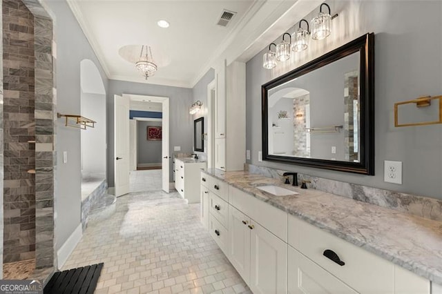 15815 Winterfield Way, Alpharetta, GA 30004 - full bathroom featuring ornamental molding, two vanities, a tile shower, tile patterned flooring, and baseboards