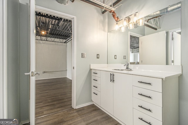 195 Arizona Ave Unit 179, Atlanta, GA 30307 - bathroom featuring wood finished floors, baseboards, and vanity