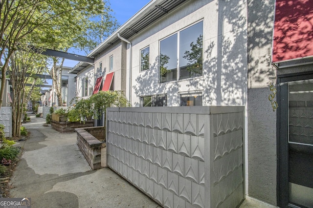 195 Arizona Ave Unit 179, Atlanta, GA 30307 - view of side of home featuring stucco siding