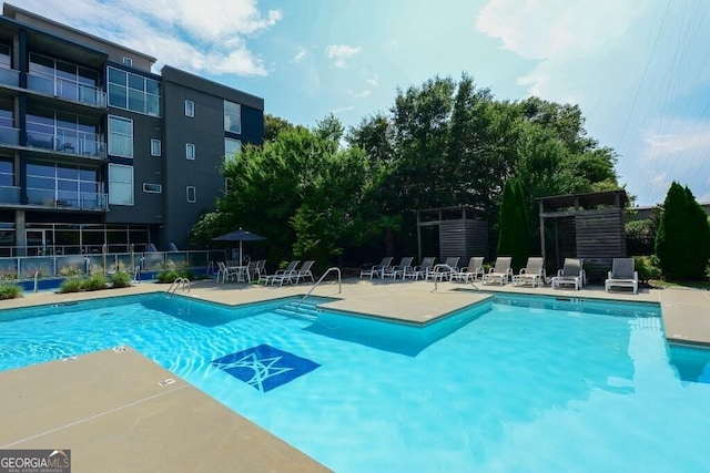 195 Arizona Ave Unit 179, Atlanta, GA 30307 - community pool featuring fence and a patio area
