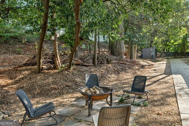 195 Arizona Ave Unit 179, Atlanta, GA 30307 - view of yard with an outdoor fire pit and a patio area