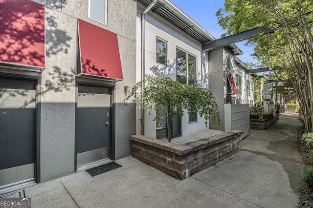 195 Arizona Ave Unit 179, Atlanta, GA 30307 - doorway to property with stucco siding