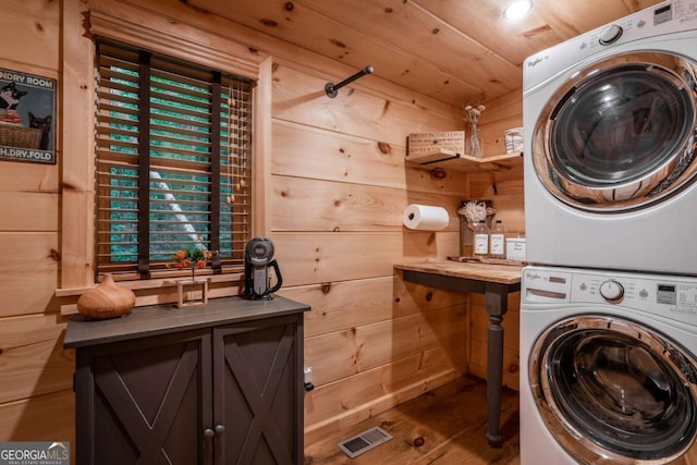 17 S Nicholas Way, Ellijay, GA 30540 - laundry room with stacked washer and clothes dryer, wood finished floors, and wooden walls