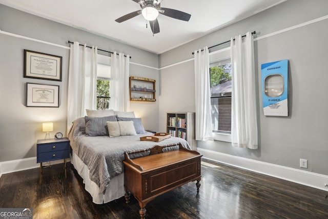 1211 Mortimer Pl SE, Atlanta, GA 30317 - bedroom featuring multiple windows, baseboards, wood finished floors, and a ceiling fan