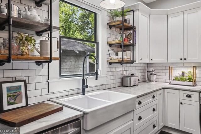 1211 Mortimer Pl SE, Atlanta, GA 30317 - kitchen featuring open shelves, a sink, decorative backsplash, and white cabinetry