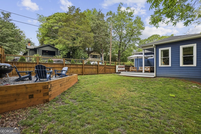 1211 Mortimer Pl SE, Atlanta, GA 30317 - view of yard featuring a fire pit and a deck