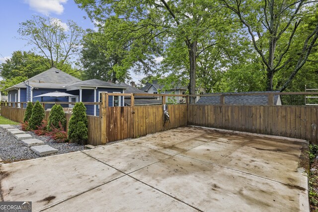 1211 Mortimer Pl SE, Atlanta, GA 30317 - view of patio / terrace with a fenced front yard and a gate