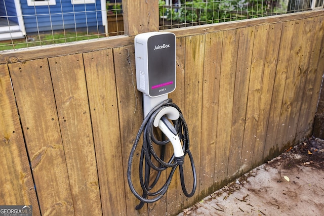 1211 Mortimer Pl SE, Atlanta, GA 30317 - exterior view of fence and electric vehicle charger