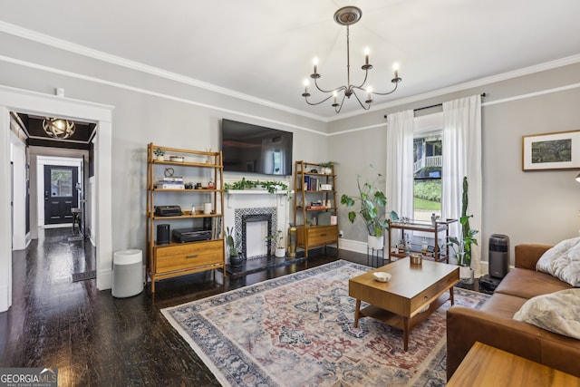 1211 Mortimer Pl SE, Atlanta, GA 30317 - living room featuring a chandelier, crown molding, a tile fireplace, baseboards, and wood finished floors