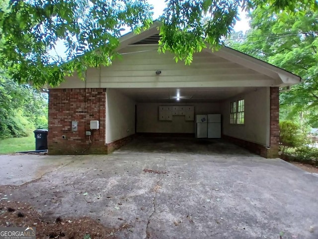 3026 Hidden Forest Dr, Snellville, GA 30078 - view of vehicle parking featuring concrete driveway and an attached carport