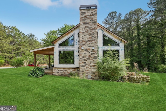 2003 Greeson Rd, Dacula, GA 30019 - view of property exterior with a yard and a chimney
