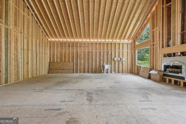 2003 Greeson Rd, Dacula, GA 30019 - miscellaneous room featuring high vaulted ceiling and a garage