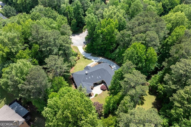drone / aerial view of a heavily wooded area