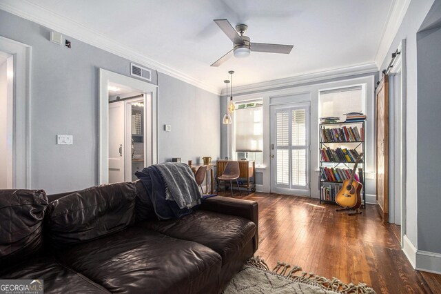 61 16th St NE Unit 4, Atlanta, GA 30309 - living area featuring hardwood / wood-style flooring, crown molding, ceiling fan, and baseboards