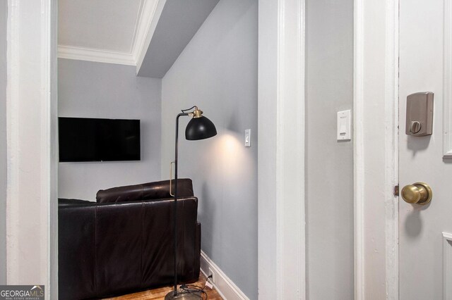 61 16th St NE Unit 4, Atlanta, GA 30309 - living room with crown molding and baseboards