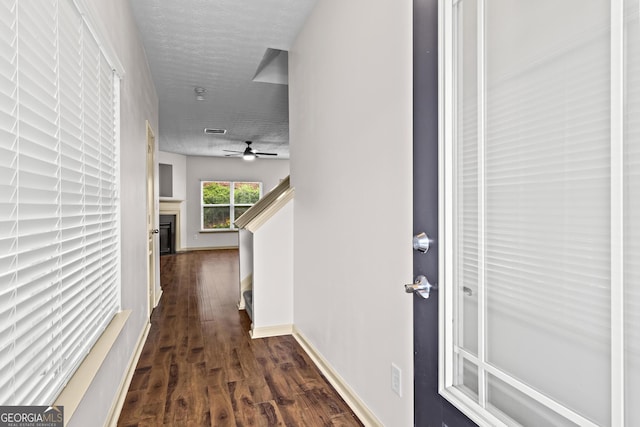 867 Crested Hawk Trl, Sugar Hill, GA 30518 - corridor with dark wood-style floors and baseboards