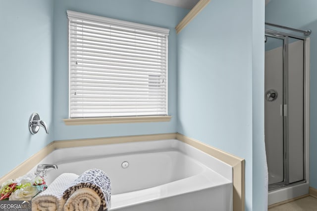 867 Crested Hawk Trl, Sugar Hill, GA 30518 - bathroom featuring a shower stall and a garden tub