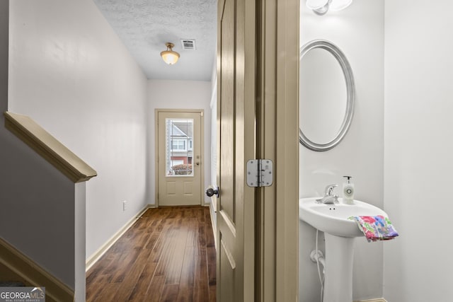 867 Crested Hawk Trl, Sugar Hill, GA 30518 - bathroom with hardwood / wood-style flooring and a textured ceiling