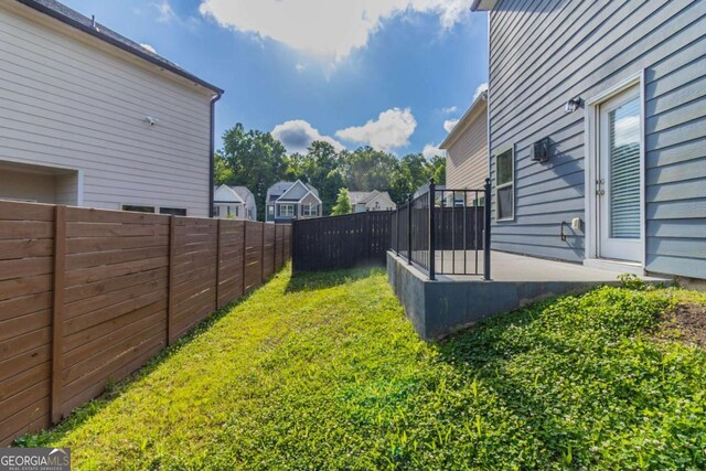 4183 May Apple Ln, Atlanta, GA 30349 - view of yard featuring a patio area and a residential view