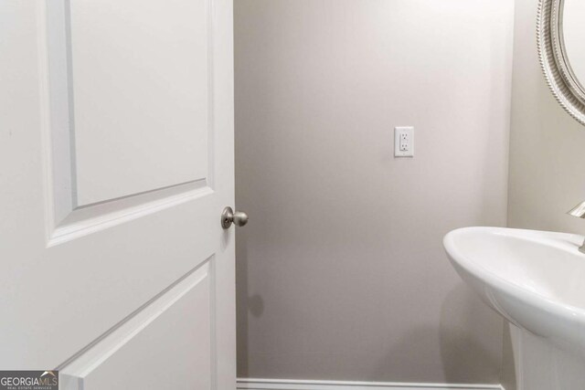 4183 May Apple Ln, Atlanta, GA 30349 - bathroom with a sink