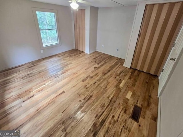 916 Friendly Mission Ln, Cornelia, GA 30531 - unfurnished bedroom with wood finished floors and baseboards