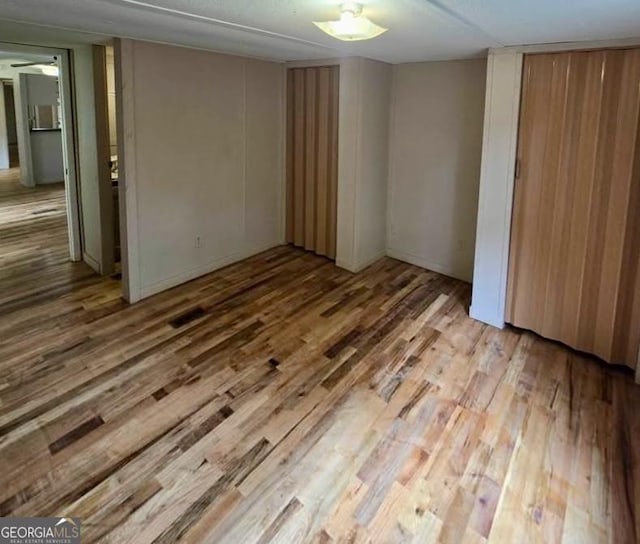 916 Friendly Mission Ln, Cornelia, GA 30531 - unfurnished bedroom with wood finished floors