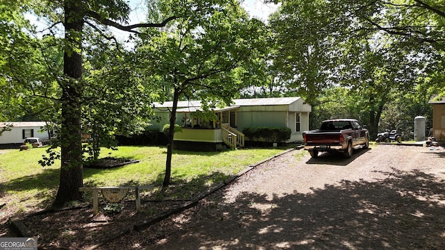 916 Friendly Mission Ln, Cornelia, GA 30531 - view of green lawn featuring driveway