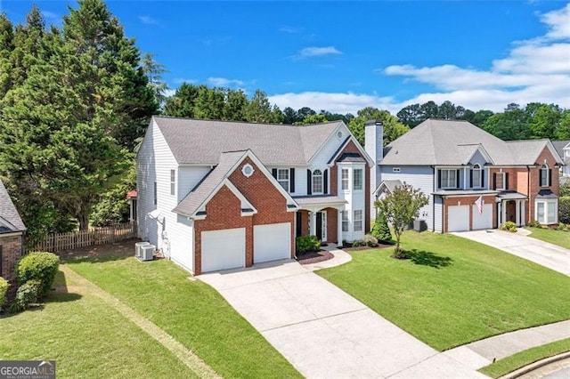 3517 Ridgemill Cir, Dacula, GA 30019 - view of front facade with concrete driveway and a chimney