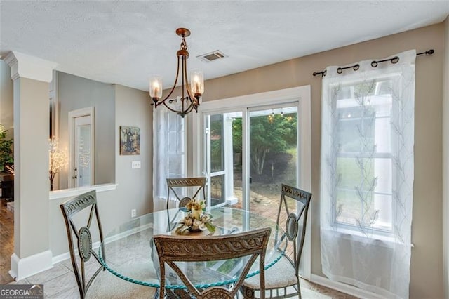 3517 Ridgemill Cir, Dacula, GA 30019 - dining space with a chandelier and baseboards