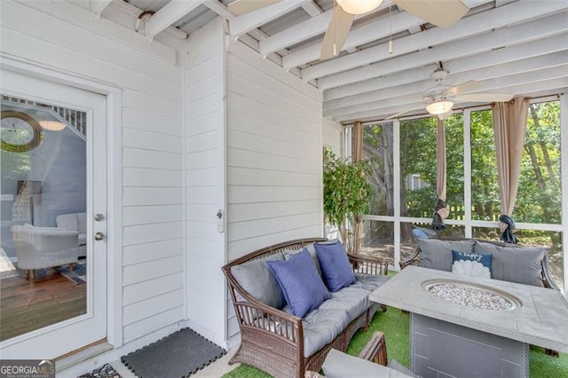 3517 Ridgemill Cir, Dacula, GA 30019 - sunroom / solarium with a ceiling fan, an outdoor living space with a fire pit, and beam ceiling