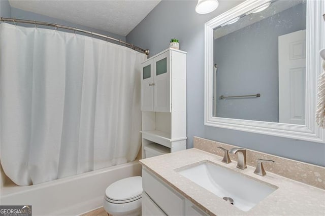 3517 Ridgemill Cir, Dacula, GA 30019 - full bathroom with vanity, shower / bath combo with shower curtain, and a textured ceiling
