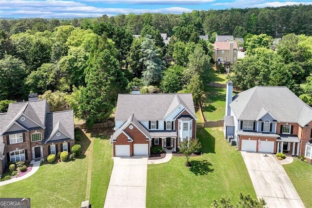 3517 Ridgemill Cir, Dacula, GA 30019 - aerial view of residential area featuring a heavily wooded area