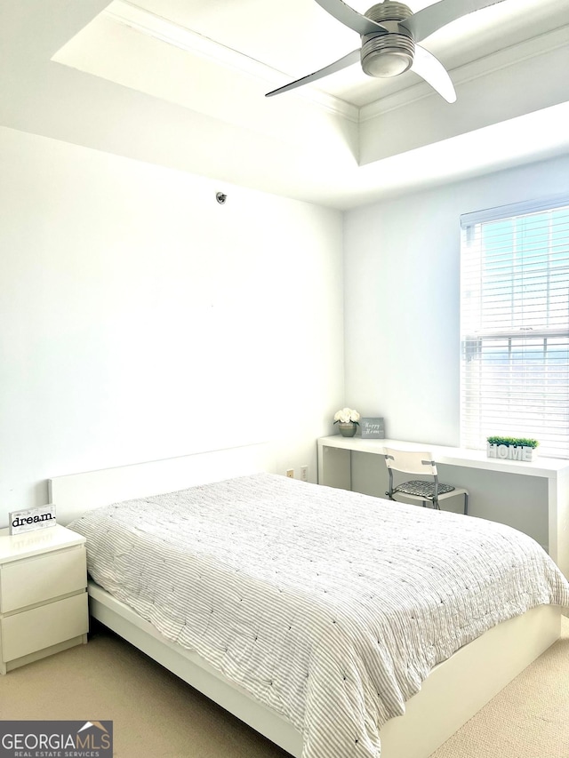 325 E Paces Ferry Rd NE Unit 1606, Atlanta, GA 30305 - carpeted bedroom with a tray ceiling and ceiling fan