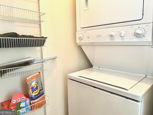 325 E Paces Ferry Rd NE Unit 1606, Atlanta, GA 30305 - washroom with stacked washer / dryer