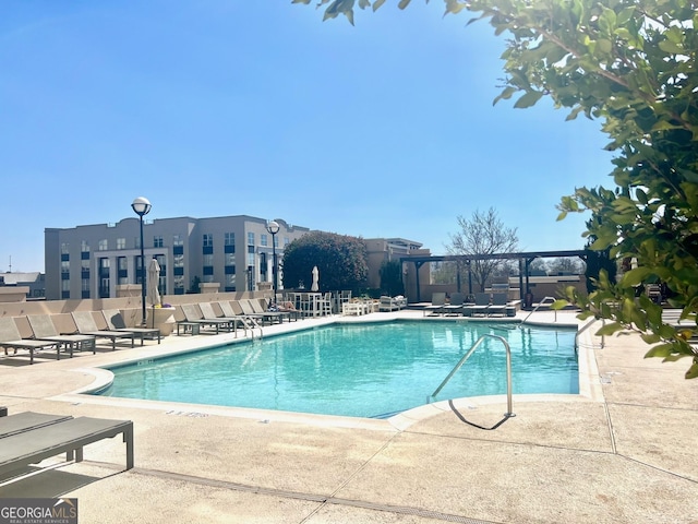 325 E Paces Ferry Rd NE Unit 1606, Atlanta, GA 30305 - community pool featuring a patio area