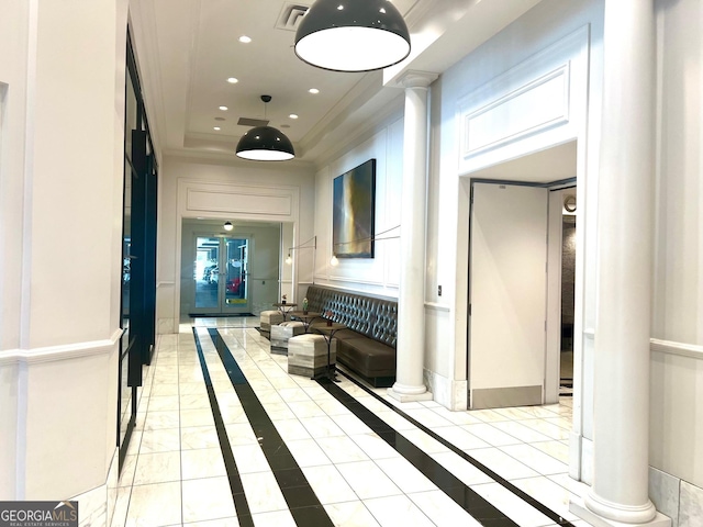 325 E Paces Ferry Rd NE Unit 1606, Atlanta, GA 30305 - corridor with a tray ceiling, decorative columns, inlaid floor details, recessed lighting, and baseboards