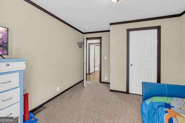 315 April Trce, Dawsonville, GA 30534 - bedroom featuring crown molding, baseboards, and light carpet