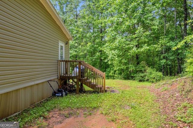 315 April Trce, Dawsonville, GA 30534 - view of yard featuring a view of trees and stairway