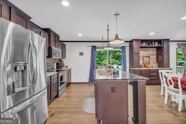 315 April Trce, Dawsonville, GA 30534 - kitchen featuring stainless steel appliances, a sink, an island with sink, backsplash, and recessed lighting