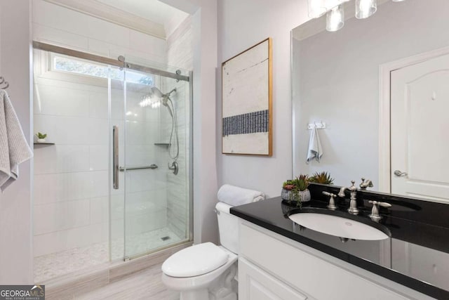 3302 Anna Ruby Ln, Buford, GA 30519 - full bathroom featuring a shower stall, vanity, and toilet