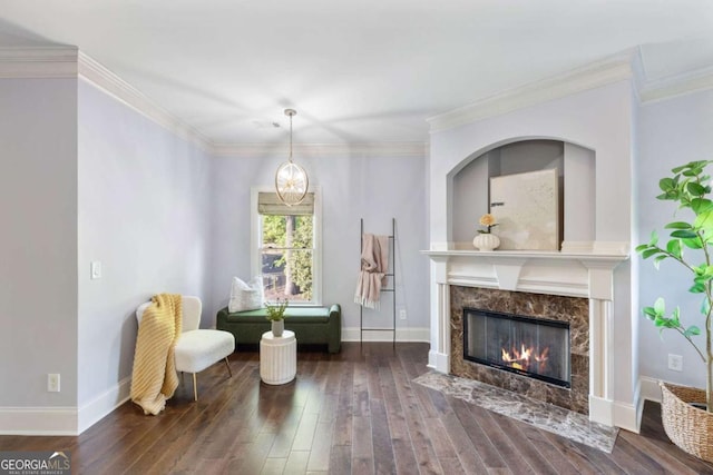 3302 Anna Ruby Ln, Buford, GA 30519 - living area featuring wood finished floors, baseboards, a high end fireplace, and ornamental molding
