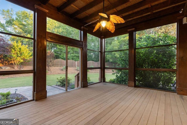 3302 Anna Ruby Ln, Buford, GA 30519 - unfurnished sunroom featuring a ceiling fan, wood-type flooring, beamed ceiling, a wooden deck, and wooden ceiling