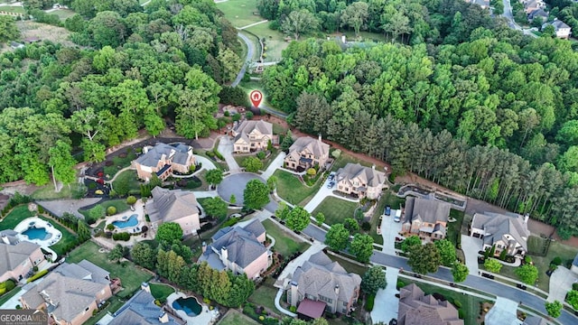 3302 Anna Ruby Ln, Buford, GA 30519 - aerial view of property and surrounding area with nearby suburban area