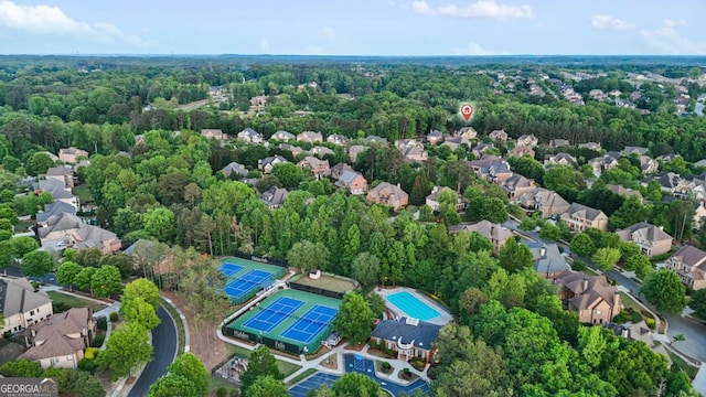 3302 Anna Ruby Ln, Buford, GA 30519 - aerial view of property's location with nearby suburban area and a forest