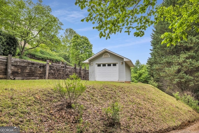 detached garage with fence