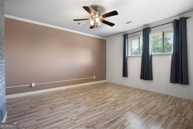 701 W Nance Springs Rd SW, Dalton, GA 30721 - empty room featuring light wood-style floors, ceiling fan, ornamental molding, and baseboards
