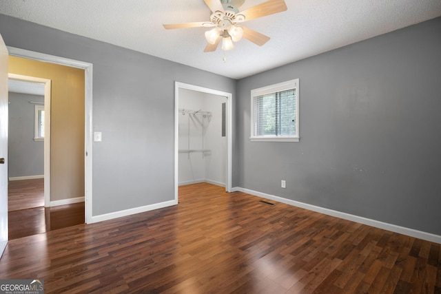 701 W Nance Springs Rd SW, Dalton, GA 30721 - unfurnished bedroom with a closet, wood finished floors, baseboards, and ceiling fan