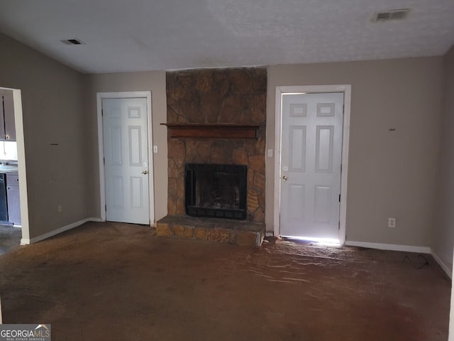 1094 Reynolds Ct, Morrow, GA 30260 - unfurnished living room featuring baseboards, a stone fireplace, and carpet floors