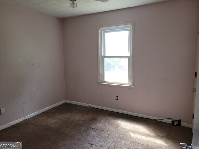 1094 Reynolds Ct, Morrow, GA 30260 - empty room with carpet floors, baseboards, and a ceiling fan